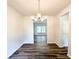 Bright dining room with modern chandelier and beautiful hardwood floors at 19 Loth Wages (Lot 19) Rd, Dacula, GA 30019