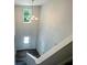 Bright foyer with a high ceiling, a modern chandelier, and beautiful hardwood floors at 19 Loth Wages (Lot 19) Rd, Dacula, GA 30019