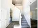 Bright foyer with high ceilings, hardwood floors, and a staircase leading to the upper level at 19 Loth Wages (Lot 19) Rd, Dacula, GA 30019