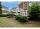 Deck and backyard with lush greenery creating a private outdoor oasis for comfortable living and entertaining at 2174 Basque Se Dr, Smyrna, GA 30080