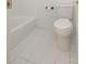 Bathroom featuring a toilet, bathtub, and tile flooring at 2174 Basque Se Dr, Smyrna, GA 30080