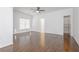 Spacious bedroom featuring hardwood floors, a ceiling fan, and plenty of natural light at 2174 Basque Se Dr, Smyrna, GA 30080