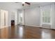 Spacious bedroom with modern ceiling fan, hardwood flooring, and natural light at 2174 Basque Se Dr, Smyrna, GA 30080