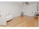 Spacious bedroom features hardwood floors, ceiling fan, and double closets at 2174 Basque Se Dr, Smyrna, GA 30080