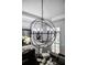 Stunning orb chandelier with candelabra lighting is the focal point of this luxurious room at 2174 Basque Se Dr, Smyrna, GA 30080