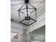 Unique caged pendant with candelabra lighting adds style to the beautiful interior of the home at 2174 Basque Se Dr, Smyrna, GA 30080
