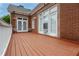 Outdoor deck with a white railing, constructed of wood, with ample space for seating at 2174 Basque Se Dr, Smyrna, GA 30080