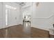 Elegant foyer features hardwood floors, white trim, and an open view to a bright living space at 2174 Basque Se Dr, Smyrna, GA 30080