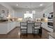 Bright kitchen featuring white cabinetry, a central island, and stainless steel appliances at 2174 Basque Se Dr, Smyrna, GA 30080