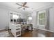 Bright office space featuring a modern desk, hardwood floors, and abundant natural light at 2174 Basque Se Dr, Smyrna, GA 30080