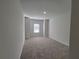 Spacious bedroom with plush carpeting and bright, natural light at 28 Loth Wages (Lot 28) Rd, Dacula, GA 30019