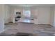 Modern kitchen with stainless steel appliances, granite countertops, and a convenient island at 28 Loth Wages (Lot 28) Rd, Dacula, GA 30019