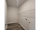 Functional laundry room with ample shelving, perfect for organizing household essentials at 28 Loth Wages (Lot 28) Rd, Dacula, GA 30019