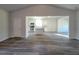 Open-concept living area with stylish flooring, seamlessly connected to the kitchen at 28 Loth Wages (Lot 28) Rd, Dacula, GA 30019