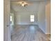 Spacious living room with high ceilings, modern flooring, and a bright, airy feel at 28 Loth Wages (Lot 28) Rd, Dacula, GA 30019