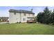 Expansive backyard with a charming deck, offering a serene outdoor space for relaxation and enjoying the natural surroundings at 4914 Brown Leaf Dr, Powder Springs, GA 30127