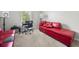 Bedroom with a red couch, gray walls, gray carpet, a window and a small work area at 4914 Brown Leaf Dr, Powder Springs, GA 30127