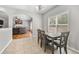 Open concept eat in kitchen with dining table and view to the living room at 4914 Brown Leaf Dr, Powder Springs, GA 30127