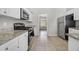 Clean kitchen features stainless steel appliances and granite countertops at 4914 Brown Leaf Dr, Powder Springs, GA 30127