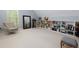 Bonus room includes ample shelving and a cozy reading nook at 5045 Huntwood Way, Roswell, GA 30075