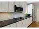 Close-up showcasing modern stainless steel appliances and granite countertops in the kitchen at 5045 Huntwood Way, Roswell, GA 30075