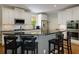 Bright kitchen featuring granite countertops, stainless steel appliances, and white cabinets at 5045 Huntwood Way, Roswell, GA 30075