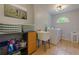 Tidy laundry room with lots of storage, modern washer and dryer and a window for natural light at 5045 Huntwood Way, Roswell, GA 30075