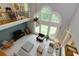 Spacious living room with a two story window, plush seating, and open to the upper level at 5045 Huntwood Way, Roswell, GA 30075