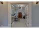 Bright office featuring modern light fixture, desk, and attractive cabinet at 5045 Huntwood Way, Roswell, GA 30075