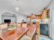 Spacious dining room adjacent to kitchen with hardwood floors, recessed lighting, and stylish decor at 555 Creekwood Xing, Roswell, GA 30076