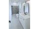 Stylish bathroom featuring modern fixtures, a walk-in shower, and a sleek vanity at 5753 Brendlynn Dr, Suwanee, GA 30024