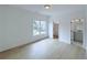 Bright bedroom with hardwood floors, closet, and ensuite bathroom at 5753 Brendlynn Dr, Suwanee, GA 30024