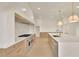 Chef's kitchen with a large range and modern appliances at 5753 Brendlynn Dr, Suwanee, GA 30024