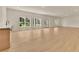 Open-concept living space with a wet bar, bright windows, and recessed lighting at 5753 Brendlynn Dr, Suwanee, GA 30024