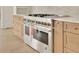 Close up of stainless steel oven and drawers at 5753 Brendlynn Dr, Suwanee, GA 30024