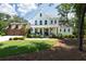 Charming modern farmhouse with a covered front porch and a well-manicured lawn at 225 Blueberry Rdg, Milton, GA 30075