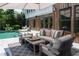 Inviting patio with comfortable seating area overlooking the swimming pool at 225 Blueberry Rdg, Milton, GA 30075