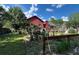 View of backyard featuring the deck and landscaping at 2539 Dogwood Hills Ct, Austell, GA 30106