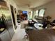 A comfortable living room with natural light, a ceiling fan, and neutral walls at 2539 Dogwood Hills Ct, Austell, GA 30106