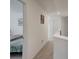 Upstairs hallway with carpet and railing, leading to bedrooms and bathrooms at 3236 Papyrus Palm Rd, Loganville, GA 30052