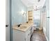 Bathroom with double sink vanity, tile floors, and combined shower and tub at 3605 Sewell Mill Rd, Marietta, GA 30062