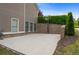 Side view of the house featuring a basketball court area, great for outdoor activity and recreation at 44 Kingsford Xing, Acworth, GA 30101