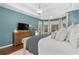 Beautiful main bedroom boasts hardwood floors and a calming decor at 44 Kingsford Xing, Acworth, GA 30101