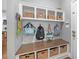 Well-organized mudroom features bench seating, hooks, and basket storage for ultimate convenience at 44 Kingsford Xing, Acworth, GA 30101