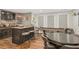 Entertainment room features a bar, shuffleboard, and a round table with chairs at 44 Kingsford Xing, Acworth, GA 30101