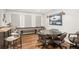 Entertainment room with custom bar area, shuffleboard table, and game space at 44 Kingsford Xing, Acworth, GA 30101