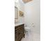 Elegant half bathroom with a marble countertop, decorative cabinet, and decorative mirror at 1477 Highway 85 Connector, Brooks, GA 30205