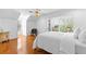 Bedroom boasts great natural light, hardwood floors, sitting area, and built-in shelves at 1477 Highway 85 Connector, Brooks, GA 30205