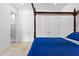 Bedroom featuring a four-poster bed, and access to dual, customized walk-in closets at 1477 Highway 85 Connector, Brooks, GA 30205