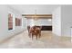 Bright dining room features a chandelier, wood table with seating for eight, and hardwood floors at 1477 Highway 85 Connector, Brooks, GA 30205